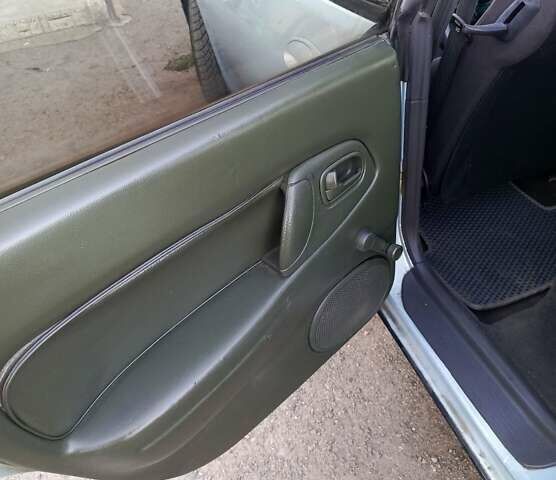 Серый Мазда 323, объемом двигателя 1.5 л и пробегом 410 тыс. км за 2200 $, фото 2 на Automoto.ua