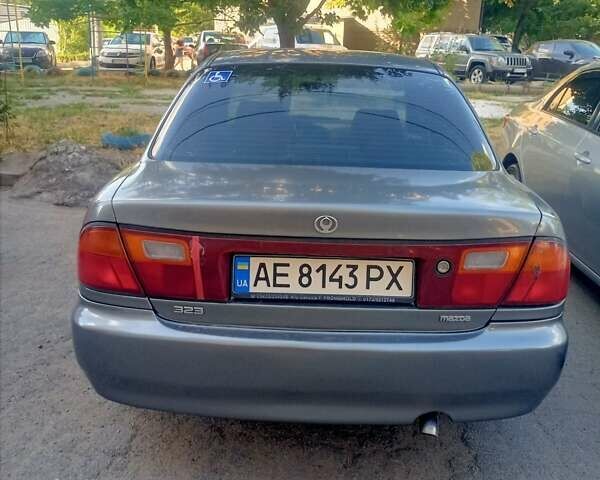 Серый Мазда 323, объемом двигателя 1.49 л и пробегом 300 тыс. км за 2600 $, фото 4 на Automoto.ua