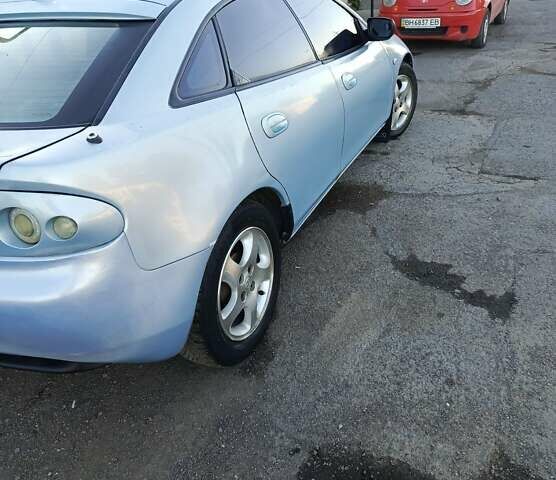 Серый Мазда 323, объемом двигателя 1.5 л и пробегом 410 тыс. км за 2200 $, фото 7 на Automoto.ua