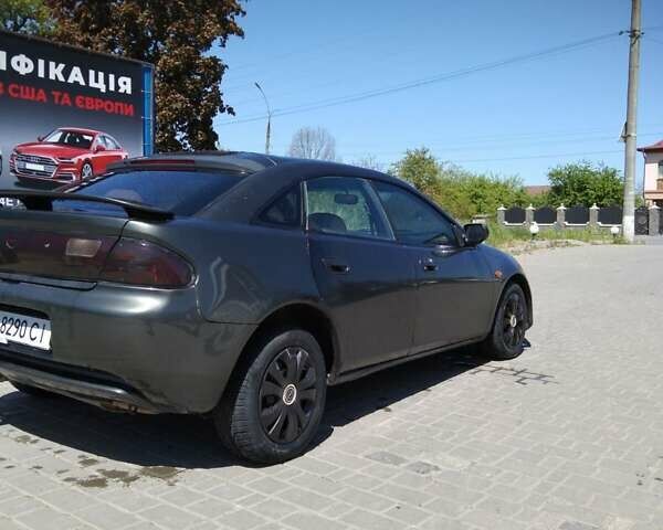 Сірий Мазда 323, об'ємом двигуна 1.5 л та пробігом 335 тис. км за 1750 $, фото 3 на Automoto.ua