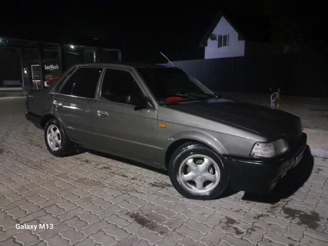 Сірий Мазда 323, об'ємом двигуна 0 л та пробігом 200 тис. км за 710 $, фото 2 на Automoto.ua