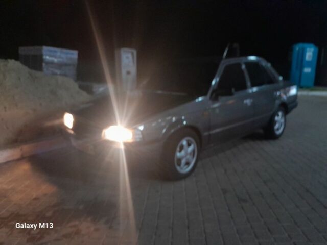 Сірий Мазда 323, об'ємом двигуна 0 л та пробігом 200 тис. км за 710 $, фото 1 на Automoto.ua