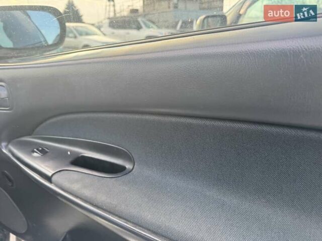 Сірий Мазда 323, об'ємом двигуна 1.49 л та пробігом 200 тис. км за 1199 $, фото 9 на Automoto.ua