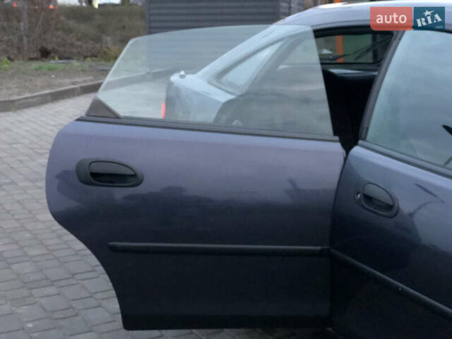 Серый Мазда 323, объемом двигателя 1.5 л и пробегом 199 тыс. км за 2000 $, фото 19 на Automoto.ua