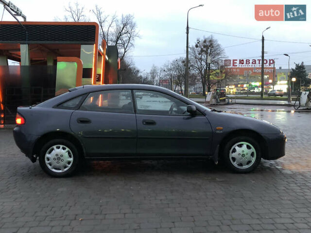 Серый Мазда 323, объемом двигателя 1.5 л и пробегом 199 тыс. км за 2000 $, фото 40 на Automoto.ua