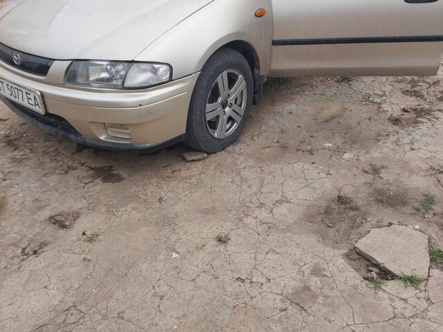 Сірий Мазда 323, об'ємом двигуна 1.5 л та пробігом 400 тис. км за 2383 $, фото 4 на Automoto.ua