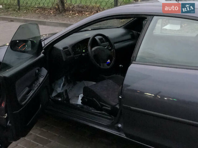 Серый Мазда 323, объемом двигателя 1.5 л и пробегом 199 тыс. км за 2000 $, фото 26 на Automoto.ua