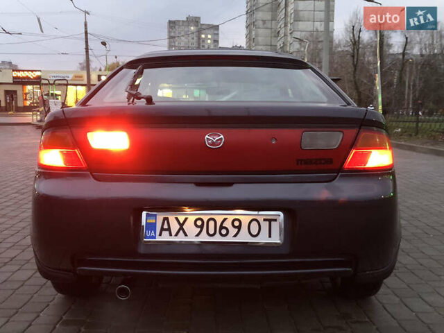 Серый Мазда 323, объемом двигателя 1.5 л и пробегом 199 тыс. км за 2000 $, фото 42 на Automoto.ua
