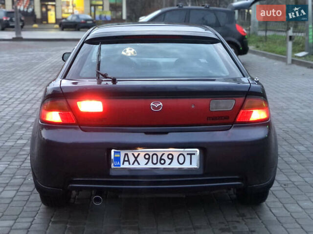 Серый Мазда 323, объемом двигателя 1.5 л и пробегом 199 тыс. км за 2000 $, фото 4 на Automoto.ua
