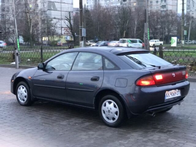 Сірий Мазда 323, об'ємом двигуна 1.5 л та пробігом 200 тис. км за 2500 $, фото 2 на Automoto.ua