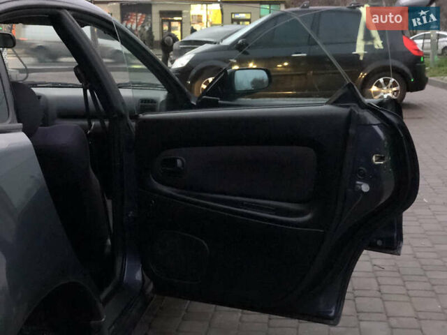 Серый Мазда 323, объемом двигателя 1.5 л и пробегом 199 тыс. км за 2000 $, фото 23 на Automoto.ua