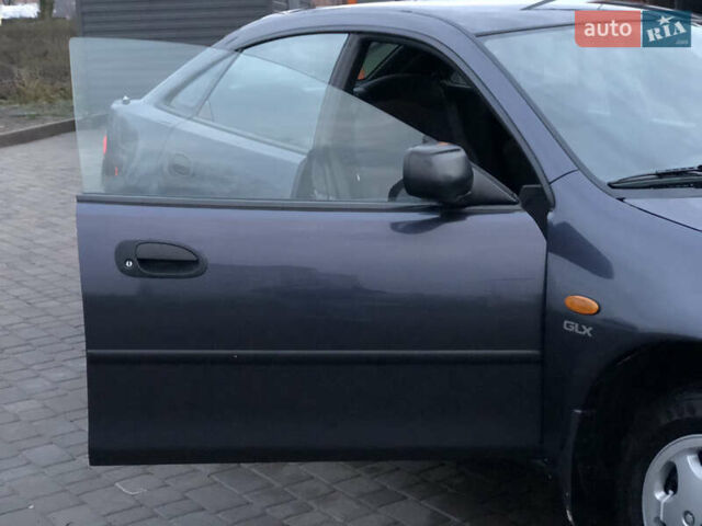 Серый Мазда 323, объемом двигателя 1.5 л и пробегом 199 тыс. км за 2000 $, фото 18 на Automoto.ua