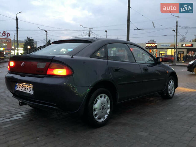 Серый Мазда 323, объемом двигателя 1.5 л и пробегом 199 тыс. км за 2000 $, фото 41 на Automoto.ua