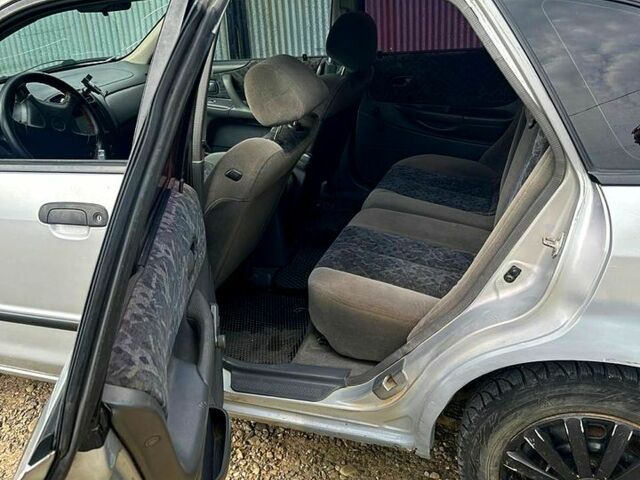 Серый Мазда 323, объемом двигателя 1.5 л и пробегом 285 тыс. км за 1700 $, фото 2 на Automoto.ua