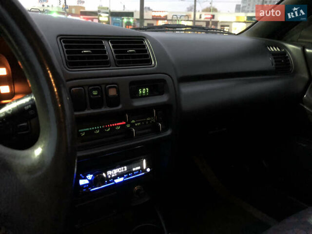 Серый Мазда 323, объемом двигателя 1.5 л и пробегом 199 тыс. км за 2000 $, фото 31 на Automoto.ua