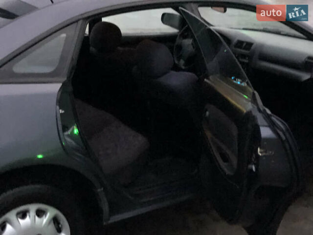 Серый Мазда 323, объемом двигателя 1.5 л и пробегом 199 тыс. км за 2000 $, фото 25 на Automoto.ua