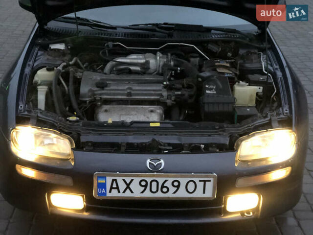 Серый Мазда 323, объемом двигателя 1.5 л и пробегом 199 тыс. км за 2000 $, фото 33 на Automoto.ua