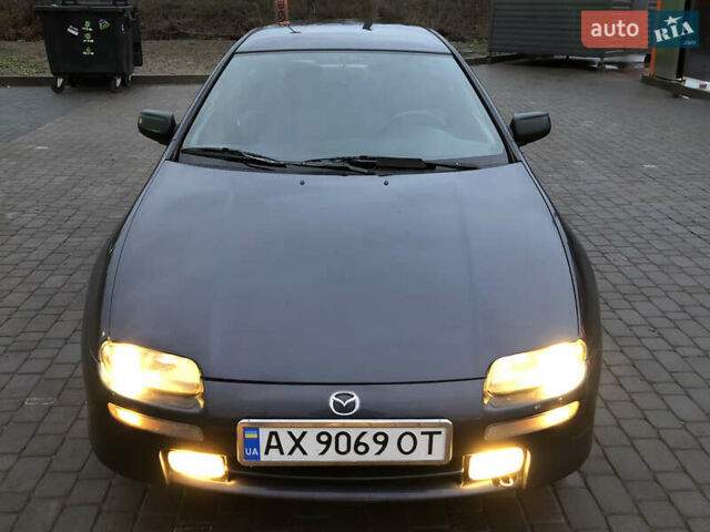 Серый Мазда 323, объемом двигателя 1.5 л и пробегом 199 тыс. км за 2000 $, фото 38 на Automoto.ua