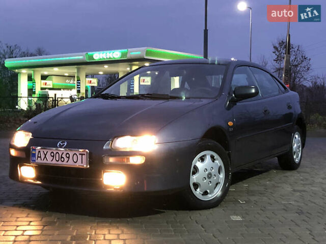 Серый Мазда 323, объемом двигателя 1.5 л и пробегом 199 тыс. км за 2000 $, фото 45 на Automoto.ua