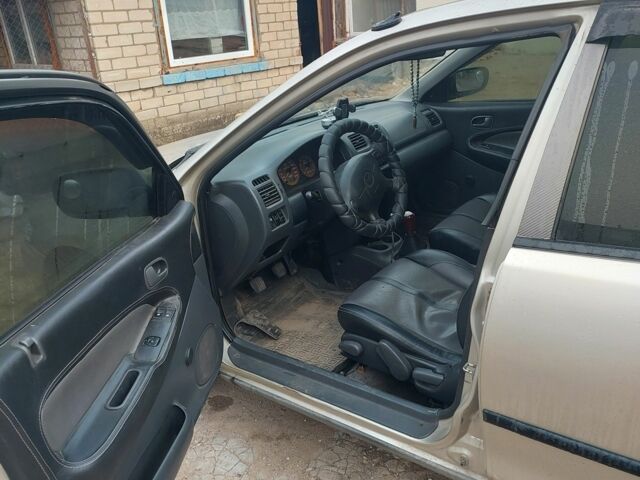 Сірий Мазда 323, об'ємом двигуна 1.5 л та пробігом 400 тис. км за 2383 $, фото 7 на Automoto.ua