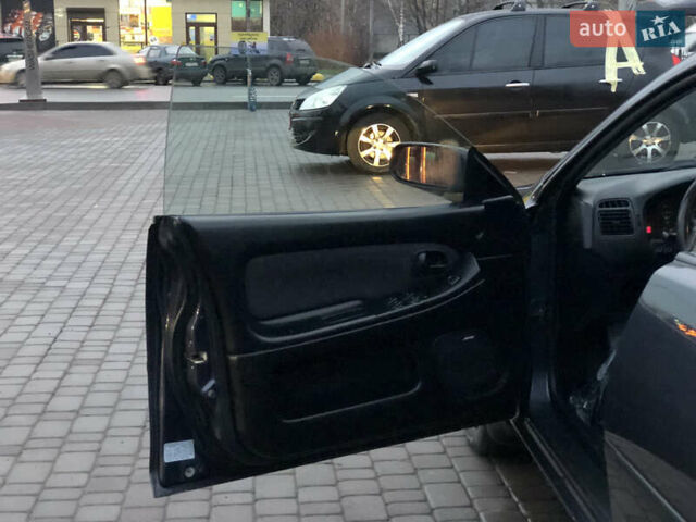 Серый Мазда 323, объемом двигателя 1.5 л и пробегом 199 тыс. км за 2000 $, фото 20 на Automoto.ua