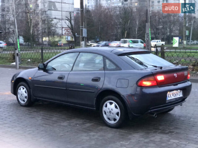 Серый Мазда 323, объемом двигателя 1.5 л и пробегом 199 тыс. км за 2000 $, фото 3 на Automoto.ua