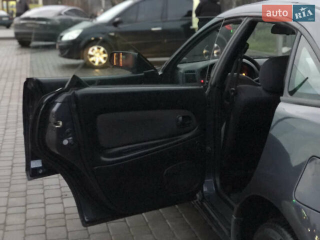 Серый Мазда 323, объемом двигателя 1.5 л и пробегом 199 тыс. км за 2000 $, фото 21 на Automoto.ua