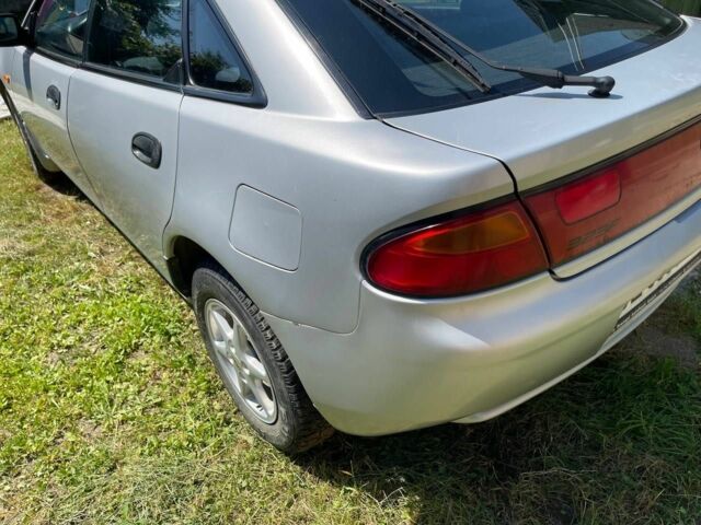 Серый Мазда 323, объемом двигателя 1.5 л и пробегом 137 тыс. км за 2800 $, фото 2 на Automoto.ua