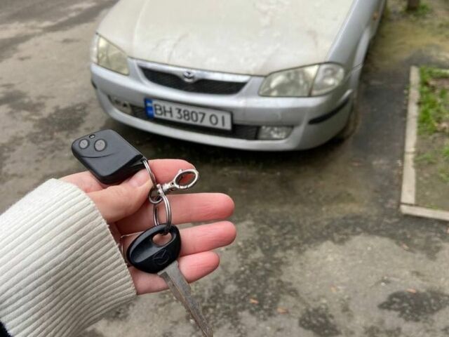 Серый Мазда 323, объемом двигателя 1.5 л и пробегом 250 тыс. км за 1901 $, фото 5 на Automoto.ua