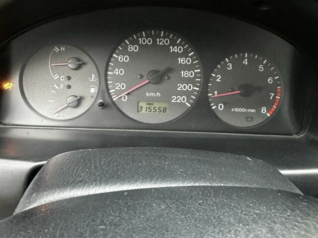 Серый Мазда 323, объемом двигателя 1.5 л и пробегом 315 тыс. км за 1300 $, фото 13 на Automoto.ua