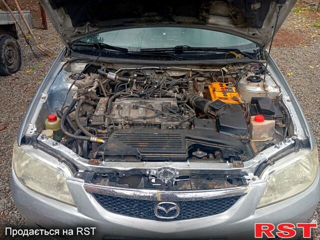 Сірий Мазда 323, об'ємом двигуна 1.8 л та пробігом 247 тис. км за 2200 $, фото 8 на Automoto.ua