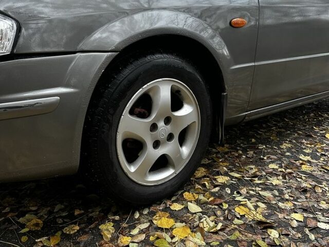 Серый Мазда 323, объемом двигателя 1.5 л и пробегом 315 тыс. км за 1300 $, фото 10 на Automoto.ua