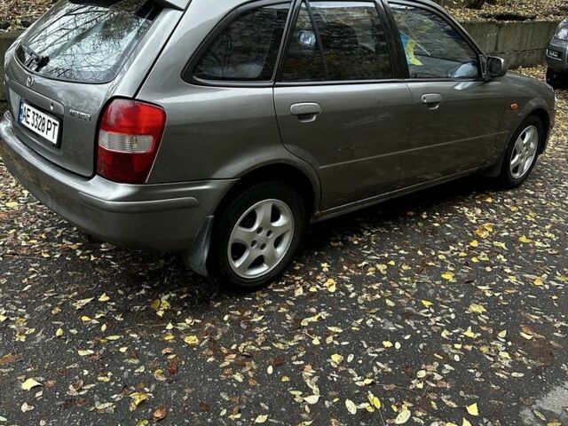 Серый Мазда 323, объемом двигателя 1.5 л и пробегом 315 тыс. км за 1300 $, фото 2 на Automoto.ua