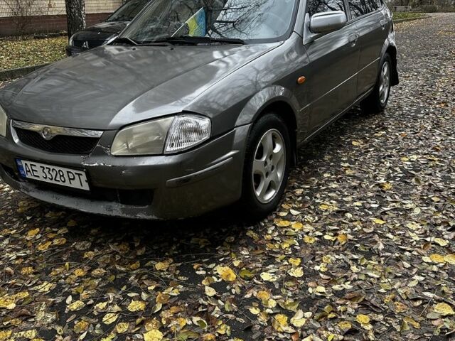 Серый Мазда 323, объемом двигателя 1.5 л и пробегом 315 тыс. км за 1300 $, фото 6 на Automoto.ua