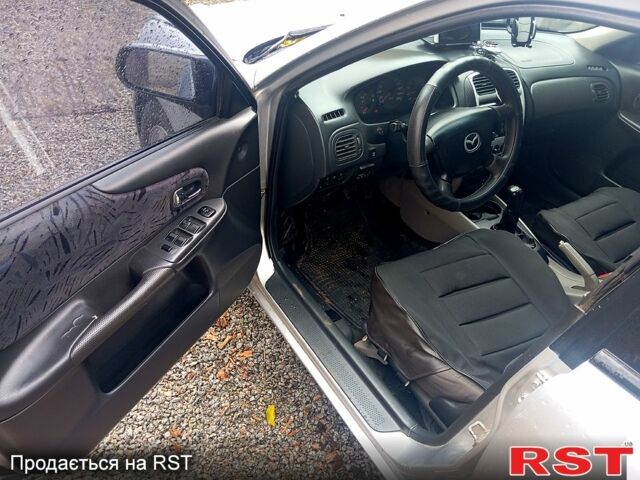 Сірий Мазда 323, об'ємом двигуна 1.8 л та пробігом 247 тис. км за 2200 $, фото 9 на Automoto.ua