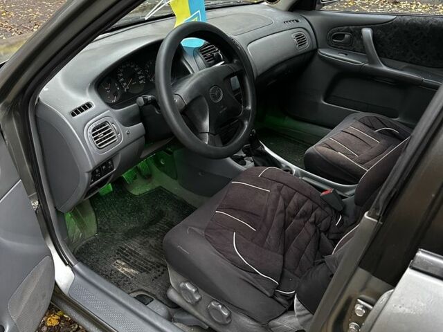 Серый Мазда 323, объемом двигателя 1.5 л и пробегом 315 тыс. км за 1300 $, фото 15 на Automoto.ua