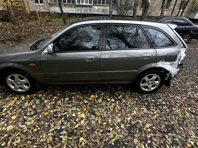 Серый Мазда 323, объемом двигателя 1.5 л и пробегом 315 тыс. км за 1300 $, фото 5 на Automoto.ua