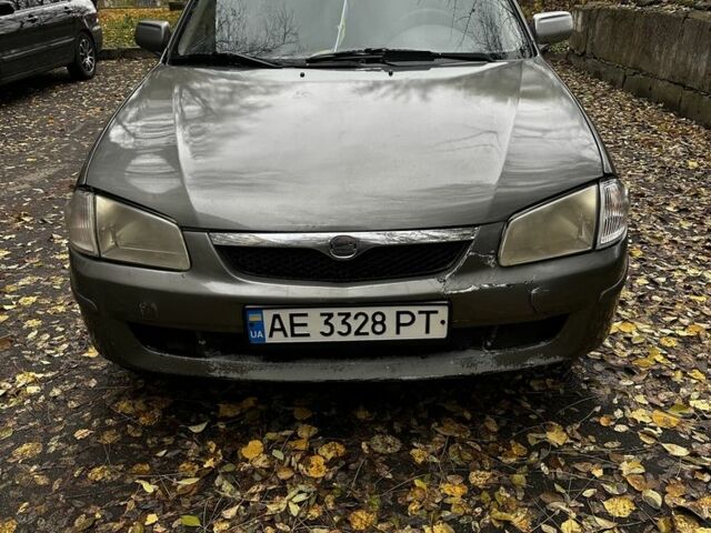 Серый Мазда 323, объемом двигателя 1.5 л и пробегом 315 тыс. км за 1300 $, фото 7 на Automoto.ua