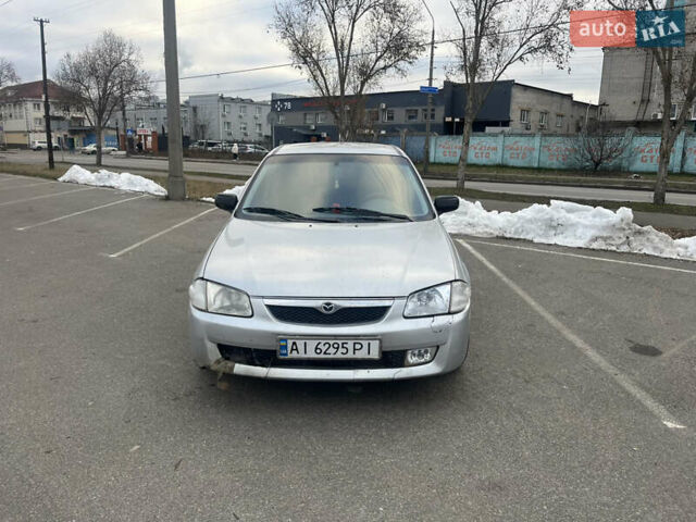 Сірий Мазда 323, об'ємом двигуна 1.5 л та пробігом 450 тис. км за 1500 $, фото 1 на Automoto.ua