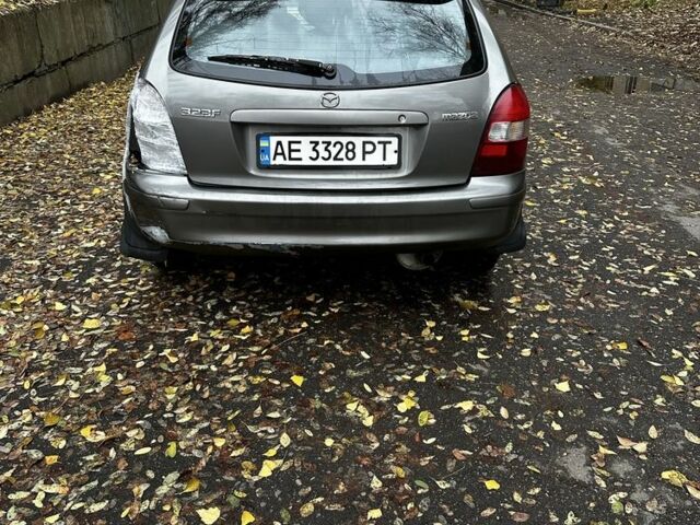 Серый Мазда 323, объемом двигателя 1.5 л и пробегом 315 тыс. км за 1300 $, фото 3 на Automoto.ua