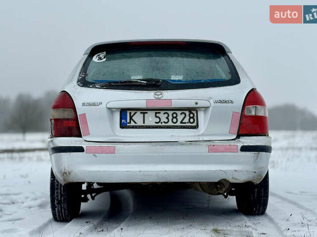 Серый Мазда 323, объемом двигателя 2 л и пробегом 389 тыс. км за 725 $, фото 5 на Automoto.ua