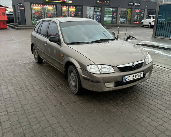 Сірий Мазда 323, об'ємом двигуна 1.49 л та пробігом 300 тис. км за 1700 $, фото 1 на Automoto.ua