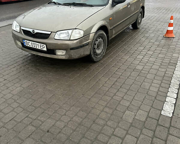 Сірий Мазда 323, об'ємом двигуна 1.49 л та пробігом 300 тис. км за 1700 $, фото 7 на Automoto.ua