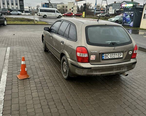 Сірий Мазда 323, об'ємом двигуна 1.49 л та пробігом 300 тис. км за 1700 $, фото 4 на Automoto.ua