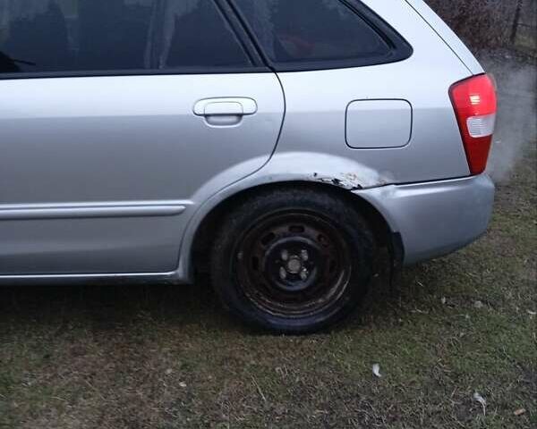 Серый Мазда 323, объемом двигателя 1.6 л и пробегом 380 тыс. км за 3000 $, фото 2 на Automoto.ua