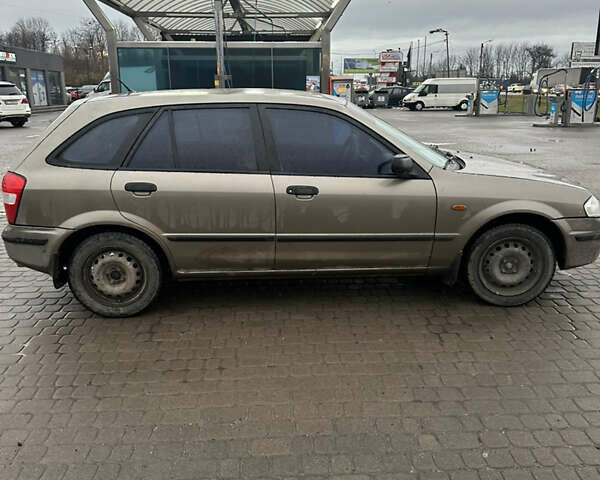 Сірий Мазда 323, об'ємом двигуна 1.49 л та пробігом 300 тис. км за 1700 $, фото 2 на Automoto.ua