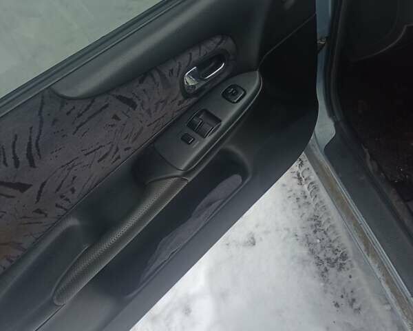 Серый Мазда 323, объемом двигателя 1.5 л и пробегом 315 тыс. км за 2800 $, фото 3 на Automoto.ua