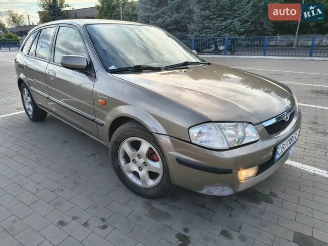 Серый Мазда 323, объемом двигателя 1.8 л и пробегом 292 тыс. км за 2250 $, фото 13 на Automoto.ua