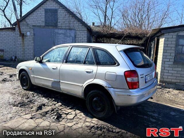 Серый Мазда 323, объемом двигателя 2 л и пробегом 284 тыс. км за 1500 $, фото 4 на Automoto.ua