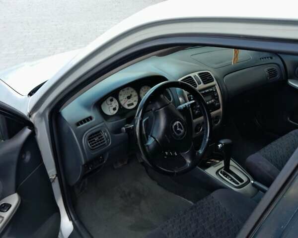 Серый Мазда 323, объемом двигателя 2 л и пробегом 258 тыс. км за 2800 $, фото 10 на Automoto.ua